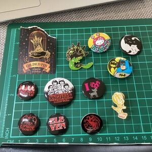 12 various button pins and push back pins lot